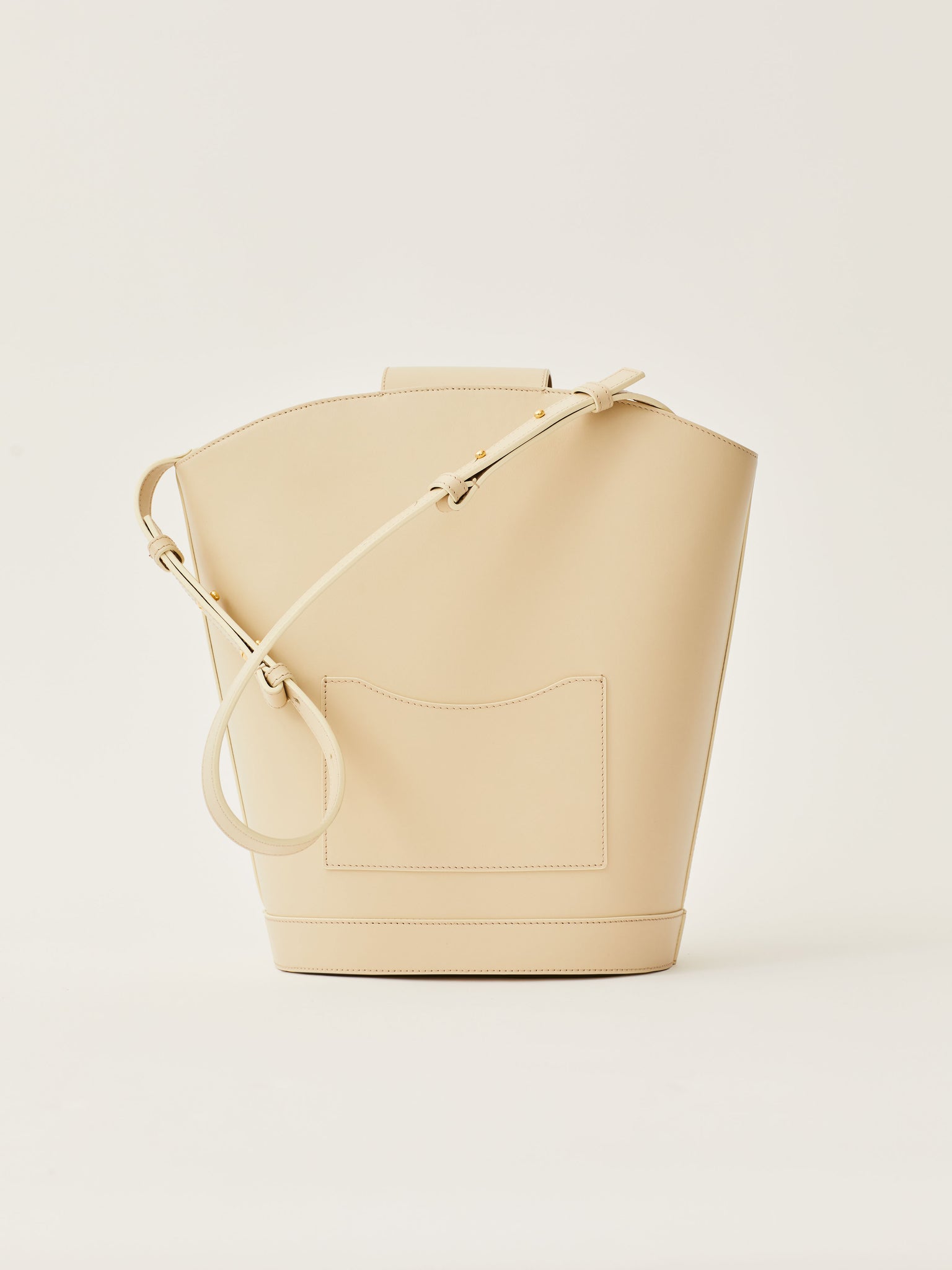 Objets Daso Ivory Leather Vivian Handbag: Back View with Draped Shoulder Strap and Back Pocket